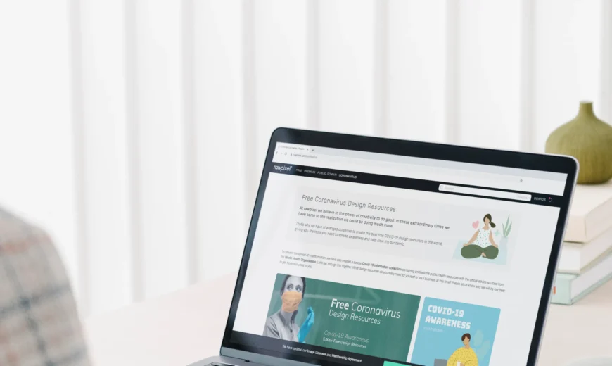 An employee using a laptop to surf website